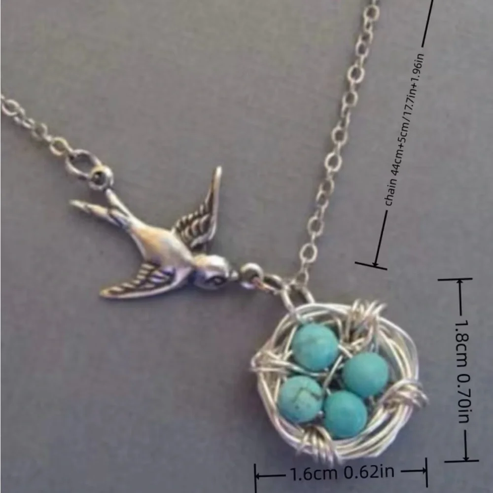 Charming Silver Bird Necklace with Turquoise Accents